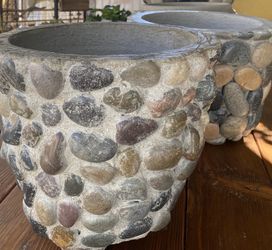 Rustic stone decorated pots