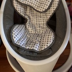 Munchkin new born rockin chair