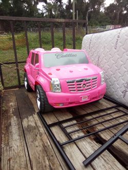 Cruise theater Cadillac Escalade power Wheels we can drive it right now it's charged $50 delivery available