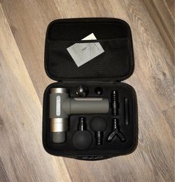 Xllent Massage gun with case and attachments. Like new