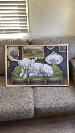Big Painting Of Bull On Couch