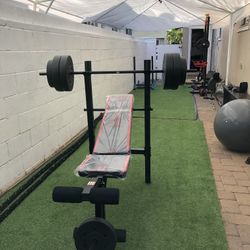 Gym Equipmentt bench press with 100lb weight set Combo With leg extension