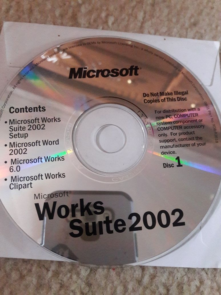 Microsoft works suite 2002 Disc 1