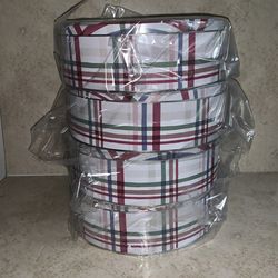 Four Decorative Round Tin Boxes