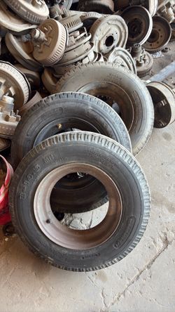 Set mobile home axles with the tires and rims