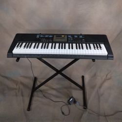 Casio Lighting Keyboard With Stand