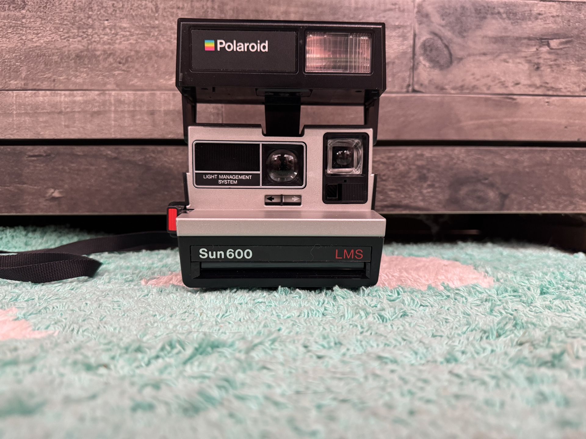 Polaroid Sun 600 LMS Camera with Strap and Color Photo Cartridge Untested AS IS