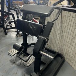 Plate loaded standing hamstring curl/ kick back