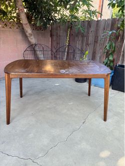 Antique Solid Wood Dining Table.  It needs some restoration,. 60” x  36” x  30” H