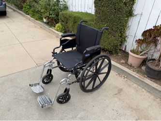 18 inches wide wheelchair in excellent condition easy to fold