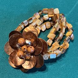  Bracelet with 3 strands of Glossy Multicolor Brown Stones and Flower highlight