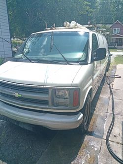 2006 Mercury Milan and 2005 3500 Chevy cargo van