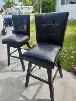 2 black bar stools