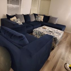 Blue Woodhaven Sectional, Chair, And Ottoman - like New