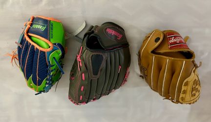 Three Leather Baseball Gloves