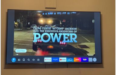 Toshiba Smart TV 75 “ Wall Mounted Flat Screen and sofa  LOCATION TAMPA
