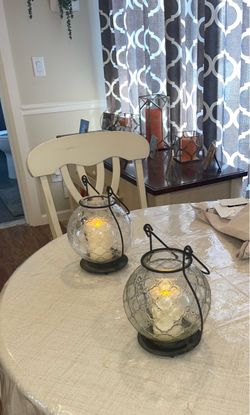 TWO ANTIQUE STYLE INDOOR/OUTDOOR METAL LANTERNS