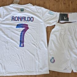 2023 Al-Nassr soccer kit set cr7 ronaldo #7 

Kids and adult size

Kids:
5/6 years old #22
6/8 years old  #24
8/10 years old #26


