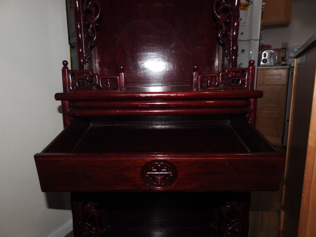 Carved Cabinet With Shelves