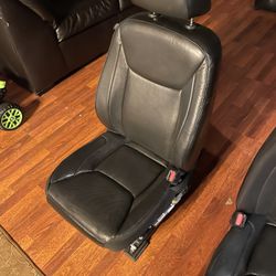 Front and rear leather seats out of a 2020 Chrysler 300