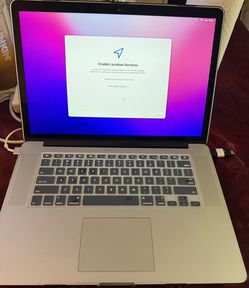Apple MacBook Pro ( Retina 15 inch Mid 2015 ) 2.8 GHZ Quad Core Intel Core I7 16 GB Ram & 256  GB HD