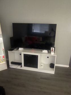 White TV Stand with Electric Fireplace Insert plus tv 50 inches