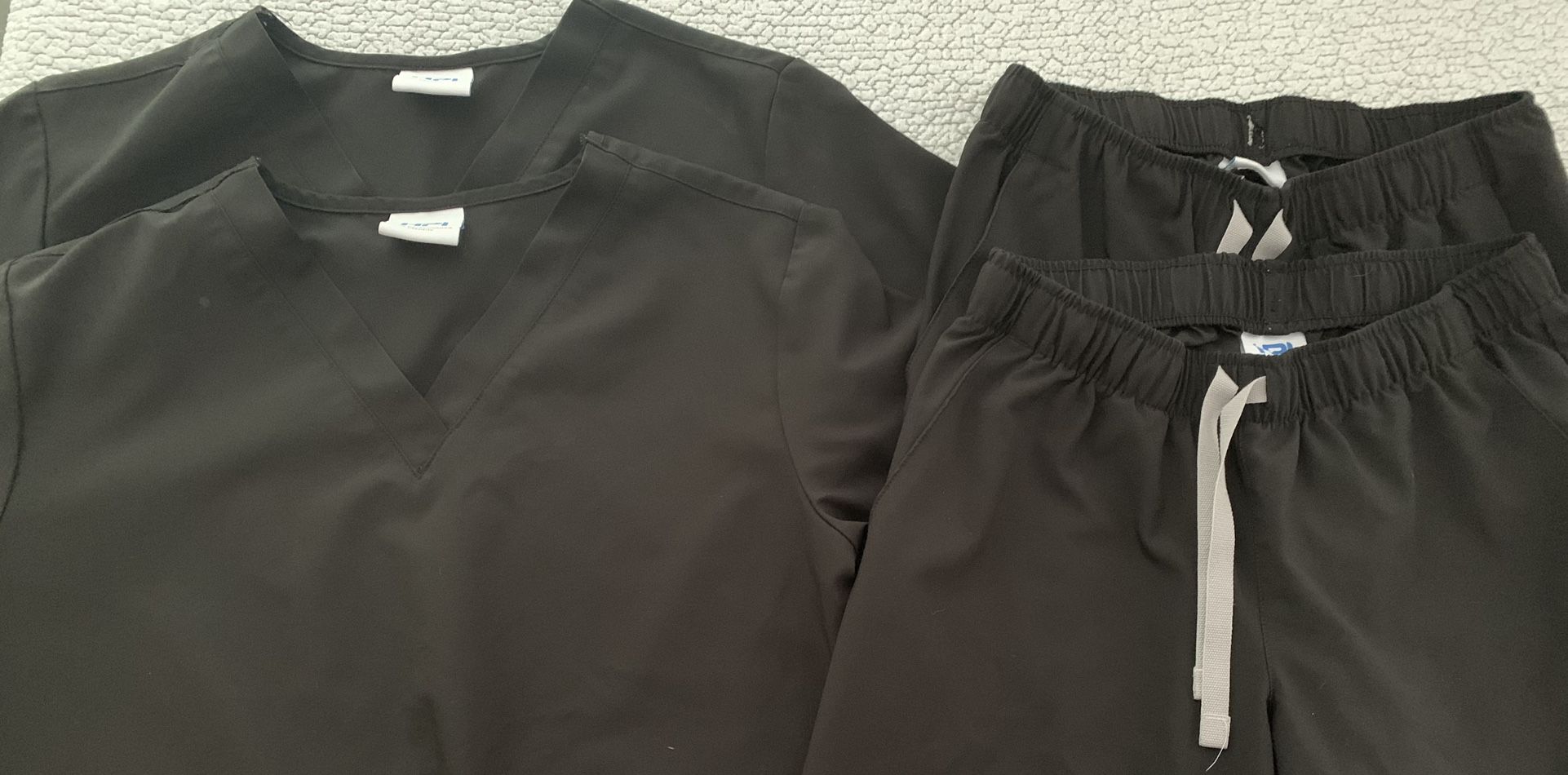 2 Sets Of Xs Black Scrubs