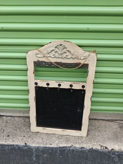 Vintage style chalkboard with hooks