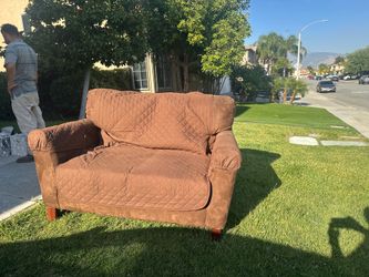 Brown love seat