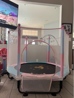 Pink and blue kids trampoline