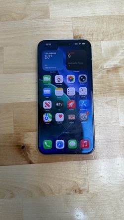 Unlocked iPhone 15 Pro Max 256GB Natural - Cracked back but works perfect.