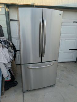 GE fridge stainless. Can deliver
