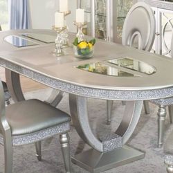 OVAL DINING TABLE SIVER CHROME SHIMMER W/ LEAF