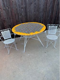 Wrought iron table and chairs