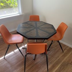 Retro Table and Orange Chairs 