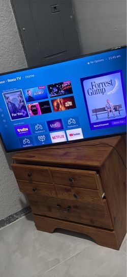 Hisense Smart TV/ Leather recliner chair & Nightstand