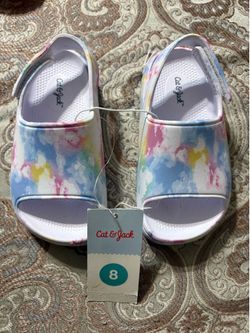 Cat & Jack toddler slide sandals featuring a pastel tie-dye pattern and an adjustable hook-and-loop strap.
