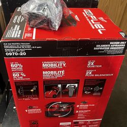 Brand new - M18 FUEL PACKOUT 18-Volt Lithium-Ion Cordless 2.5 Gal. Wet/Dry Vacuum and M18 5.0 Ah Lithium-Ion XC Battery Pack