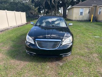 2014 Chrysler 200 hardtop convertible, black exterior tan inter￼