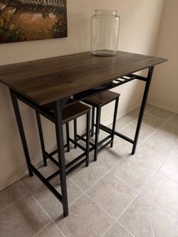 Bar table with stools