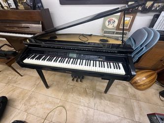 Free Suzuki electric baby grand piano