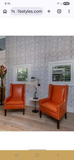 Designer 2 leather chairs Paid thousands $1500  for pair