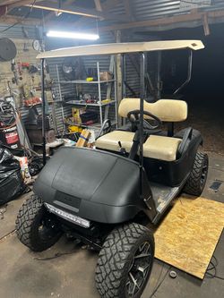 Lifted golf cart