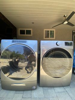 For Sale: Whirlpool Washer & LG Dryer Set  Modern front-load washer and dryer set in great