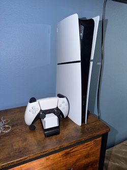 PlayStation 5 Slim with original controller and charging doc (Like New)