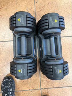 Two adjustable weights 55 pounds each