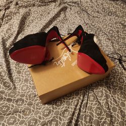 Christian Louboutin lace up heels