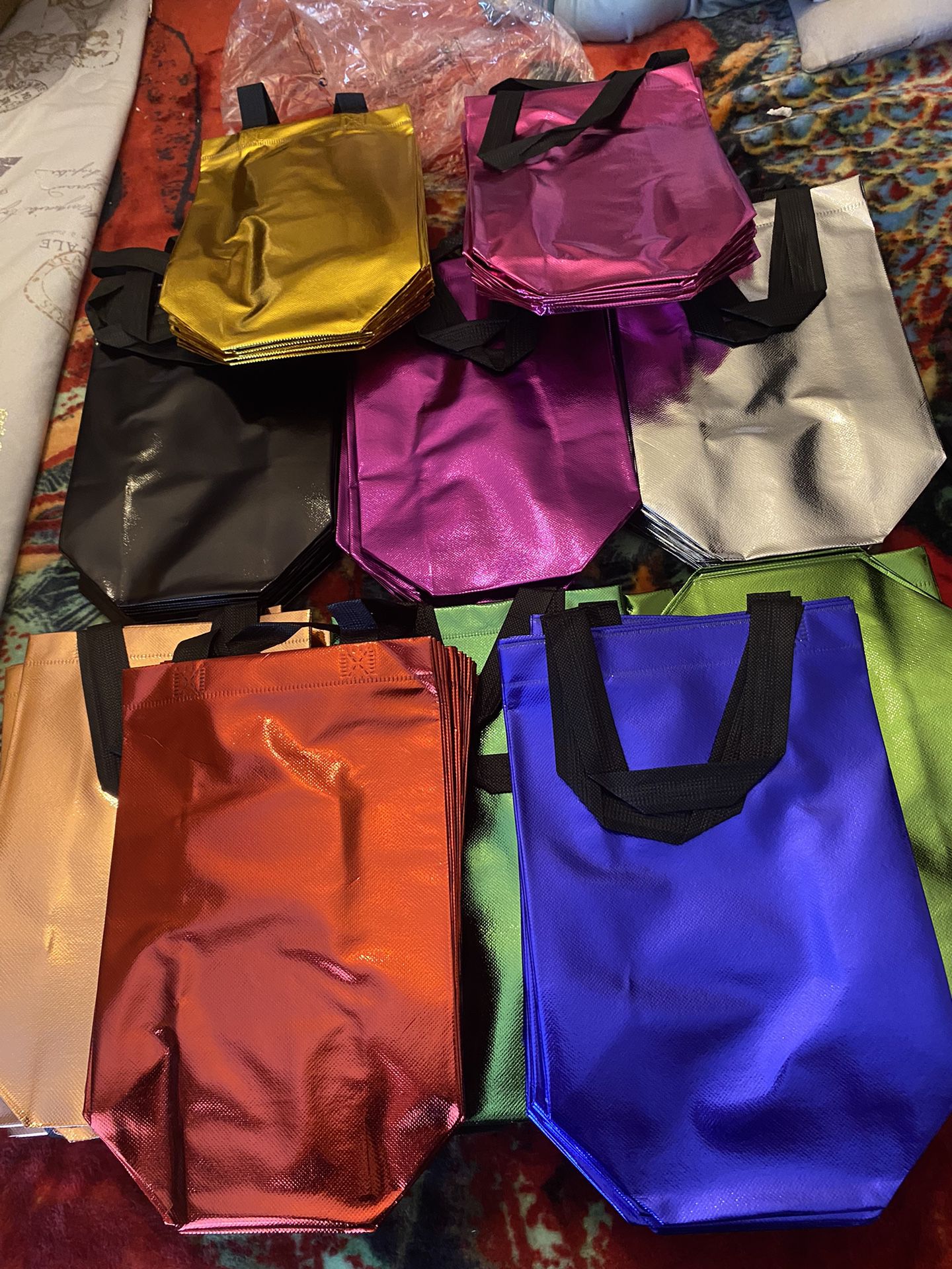 100 gift bags. different colours.
