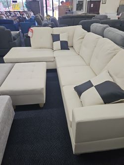 White Sectional With Ottoman