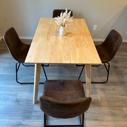 Brown Wooden Table and 4 Brown Faux Leather Chairs